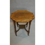 A Victorian walnut shaped top occasional table. H.76 W.76cm