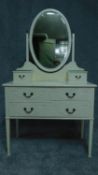 A mid 20th century dressing table with Adam style swag decoration. H.159 W.92 D.48cm