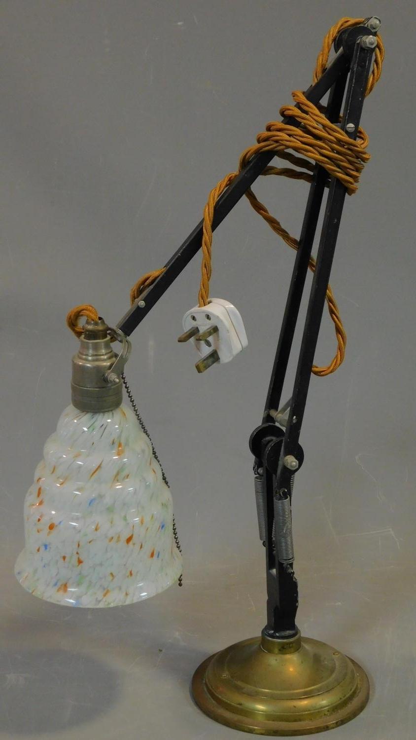 A vintage brass and metal anglepoise lamp with coloured glass shade. H.55cm