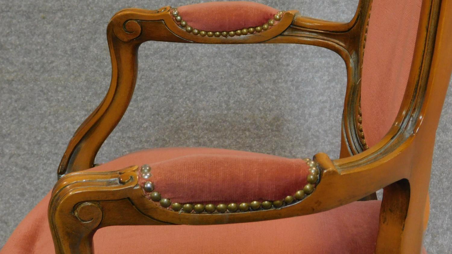 A pair of French carved beech framed open armchairs in blush upholstery on cabriole supports. H.96cm - Image 7 of 8