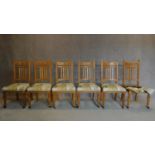 A set of six late 19th century oak Art Nouveau style dining chairs. H.92cm