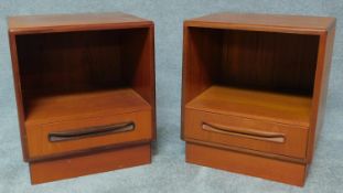 A pair of mid 20th century teak bedside cabinets. H.53 W.46 D.41cm