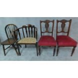 A pair of late Victorian carved walnut dining chairs, an Edwardian tub chair and a country stick