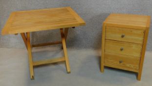 A small three drawer chest and a folding garden table. H.65 W.77 D.77cm (table)