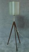 A mid 20th century floor standing lamp with ribbed perspex shade on tripod sputnik style legs. H.