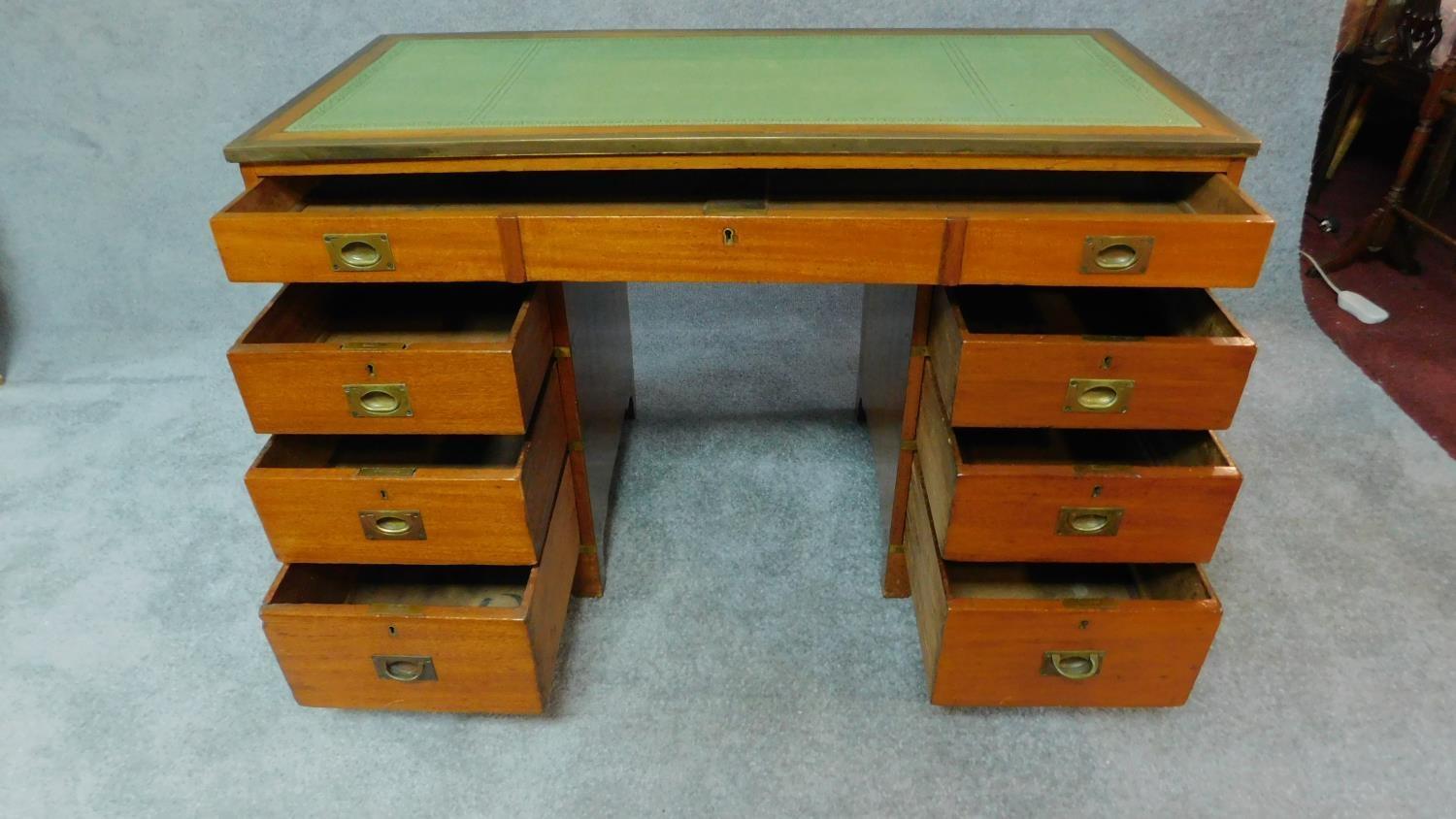 A 19th century mahogany three section brass bound military style campaign chest with inset tooled - Image 2 of 4