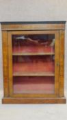 A Victorian walnut single door pier cabinet with satinwood Arabesque inlay. H.97 W.75 D.31cm