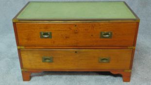 A mahogany brass bound military style chest section of two long drawers with green leather inset top