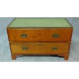 A mahogany brass bound military style chest section of two long drawers with green leather inset top