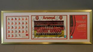 An official Arsenal F.C. signed photograph of the 2010-11 squad. 80x39cm