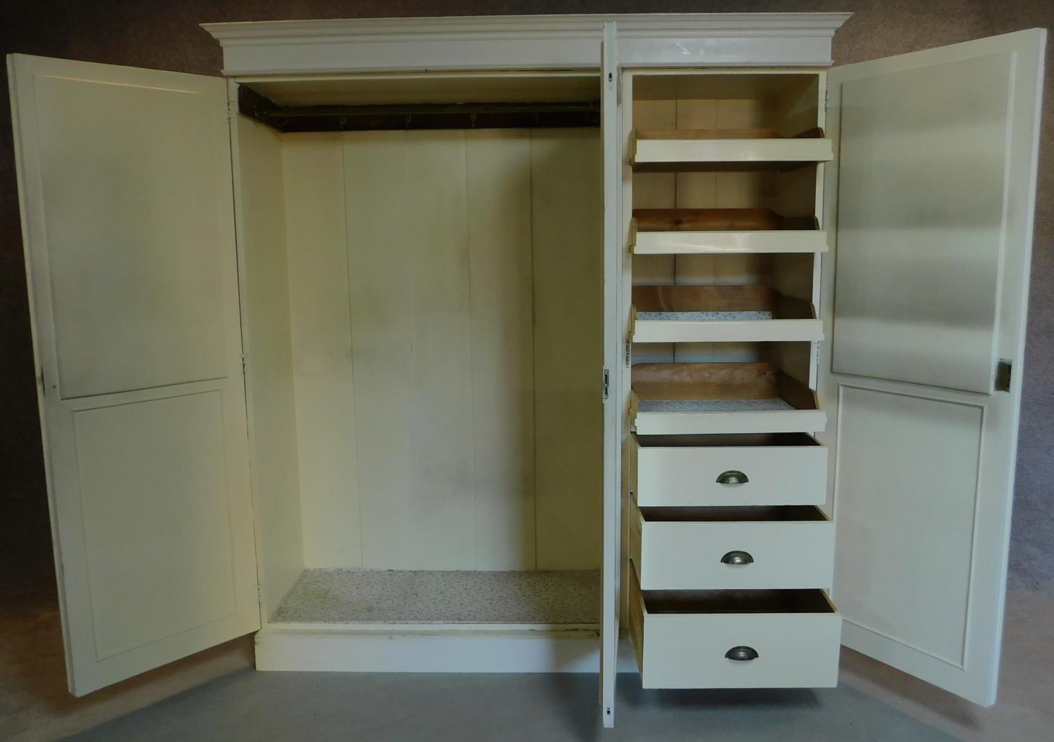 A mid 20th century white painted oak wardrobe with a fitted interior, slides and drawers and hanging - Image 2 of 5