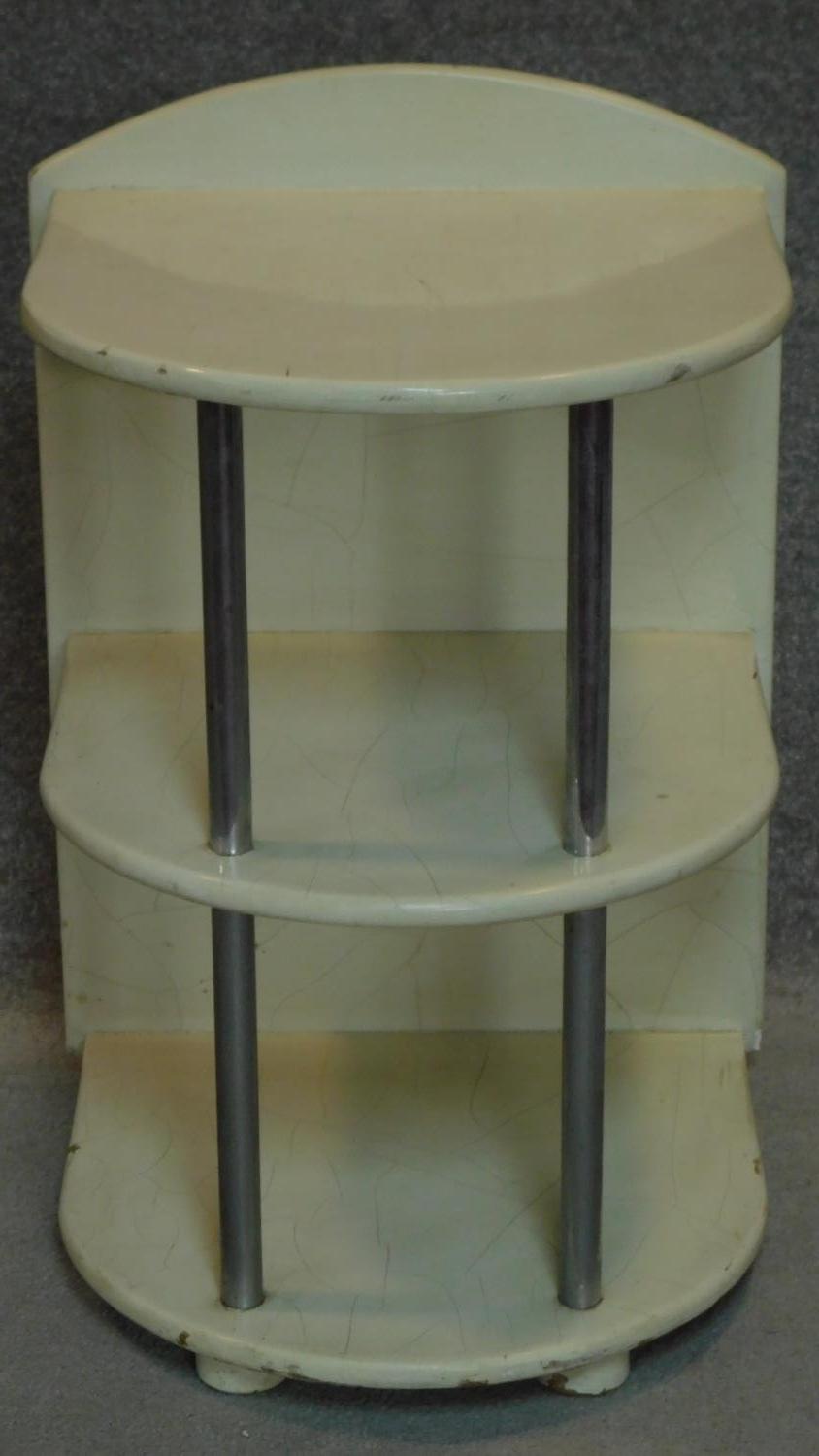 A vintage three tier etager with tubular chrome supports. H.66cm