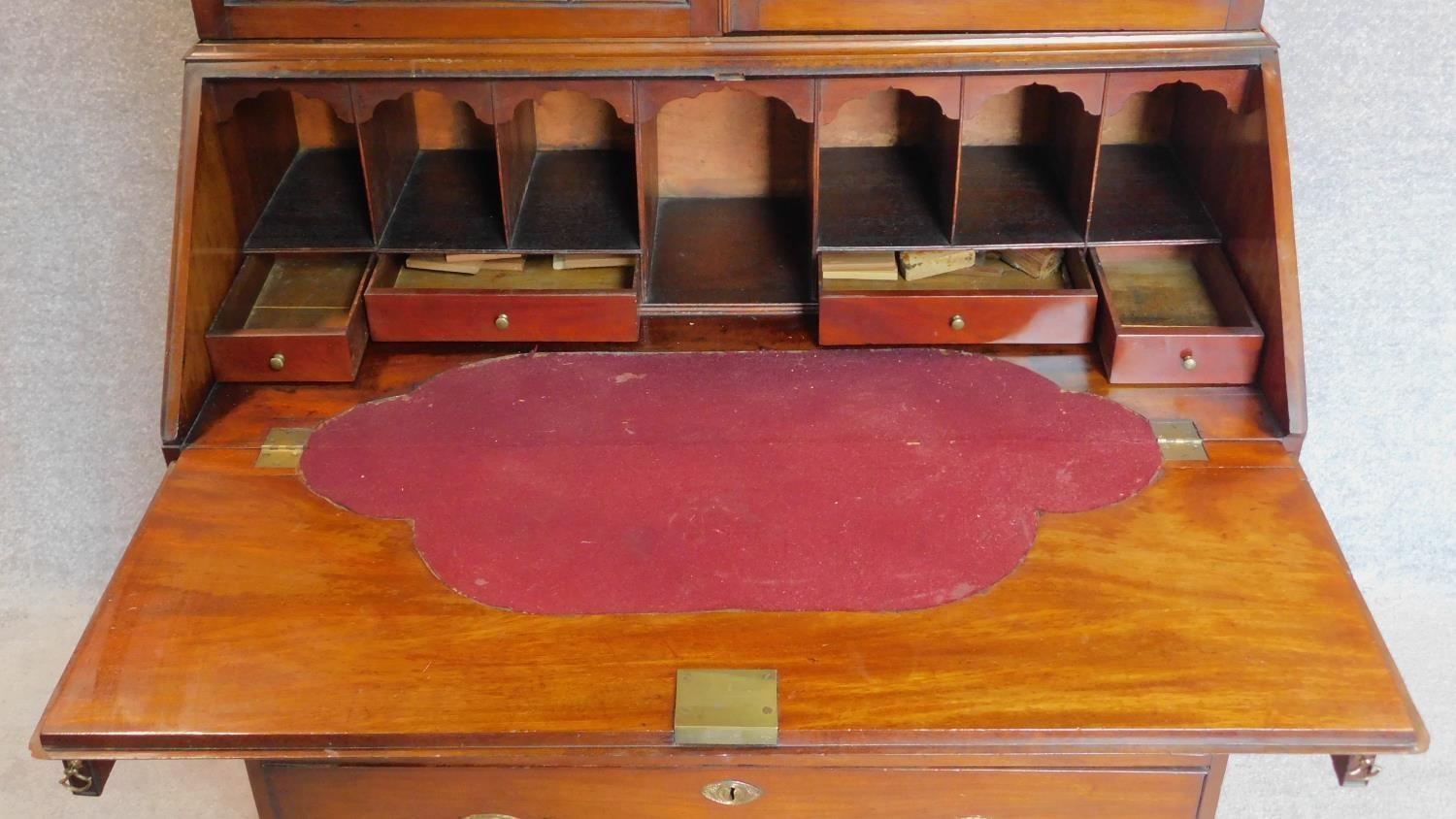 A Georgian mahogany bureau bookcase, the astragal glazed upper section above fall front revealing - Image 4 of 14