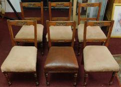 A set of six Edwardian carved beech framed dining chairs. H.86cm