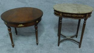 An Empire style oval marble topped occasional table and a similar low table. H.59cm (tallest)