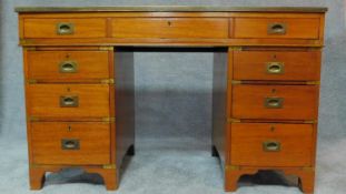 A 19th century mahogany three section brass bound military style campaign chest with inset tooled