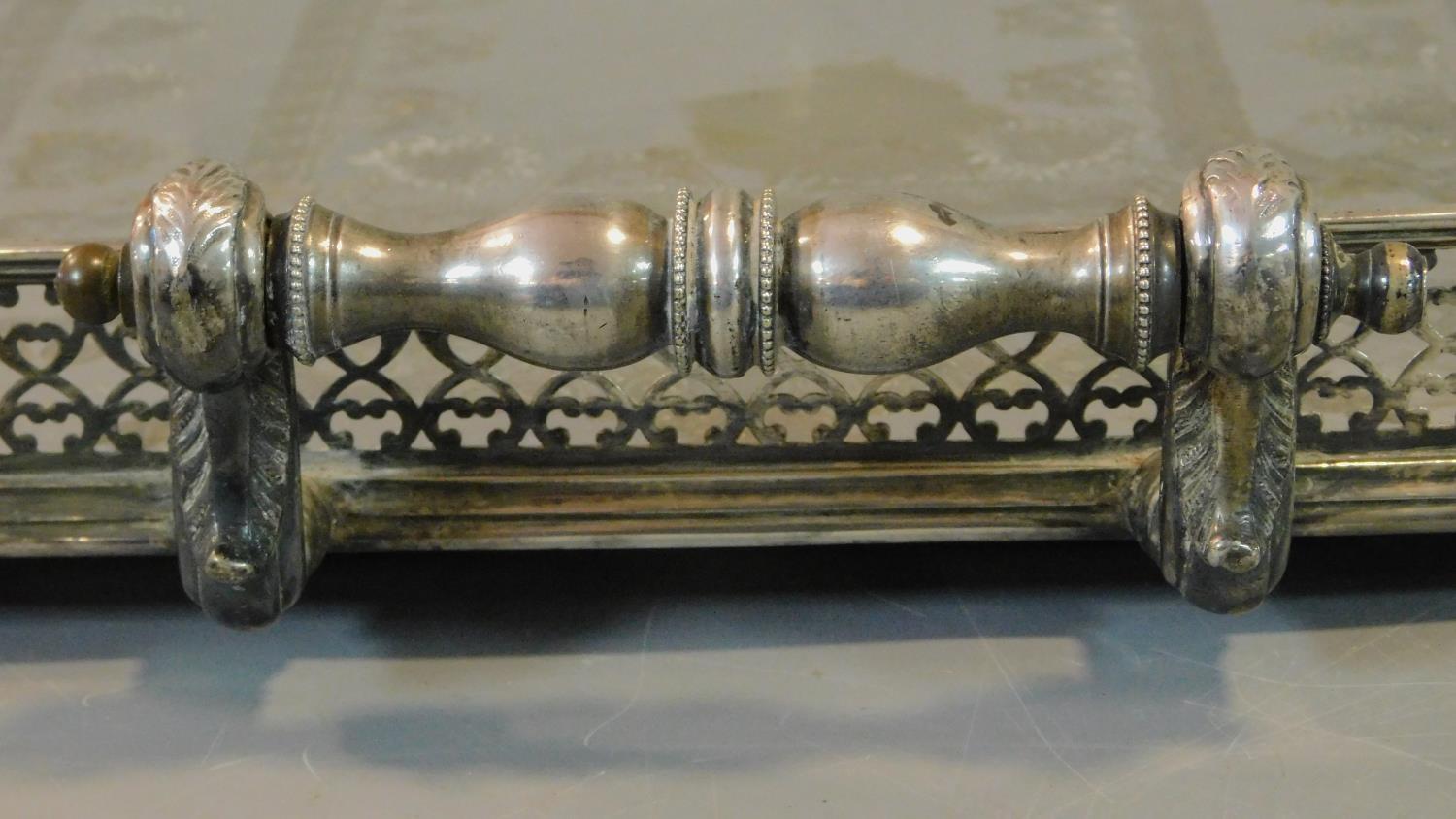 A heavy Victorian silver plated tray with pierced gallery and floral engraving. 65x39cm - Image 4 of 7