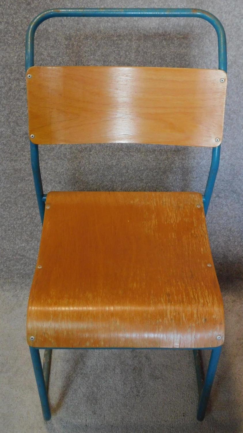 Five vintage 1950's plywood and metal stacking chairs. H.90cm - Image 3 of 6