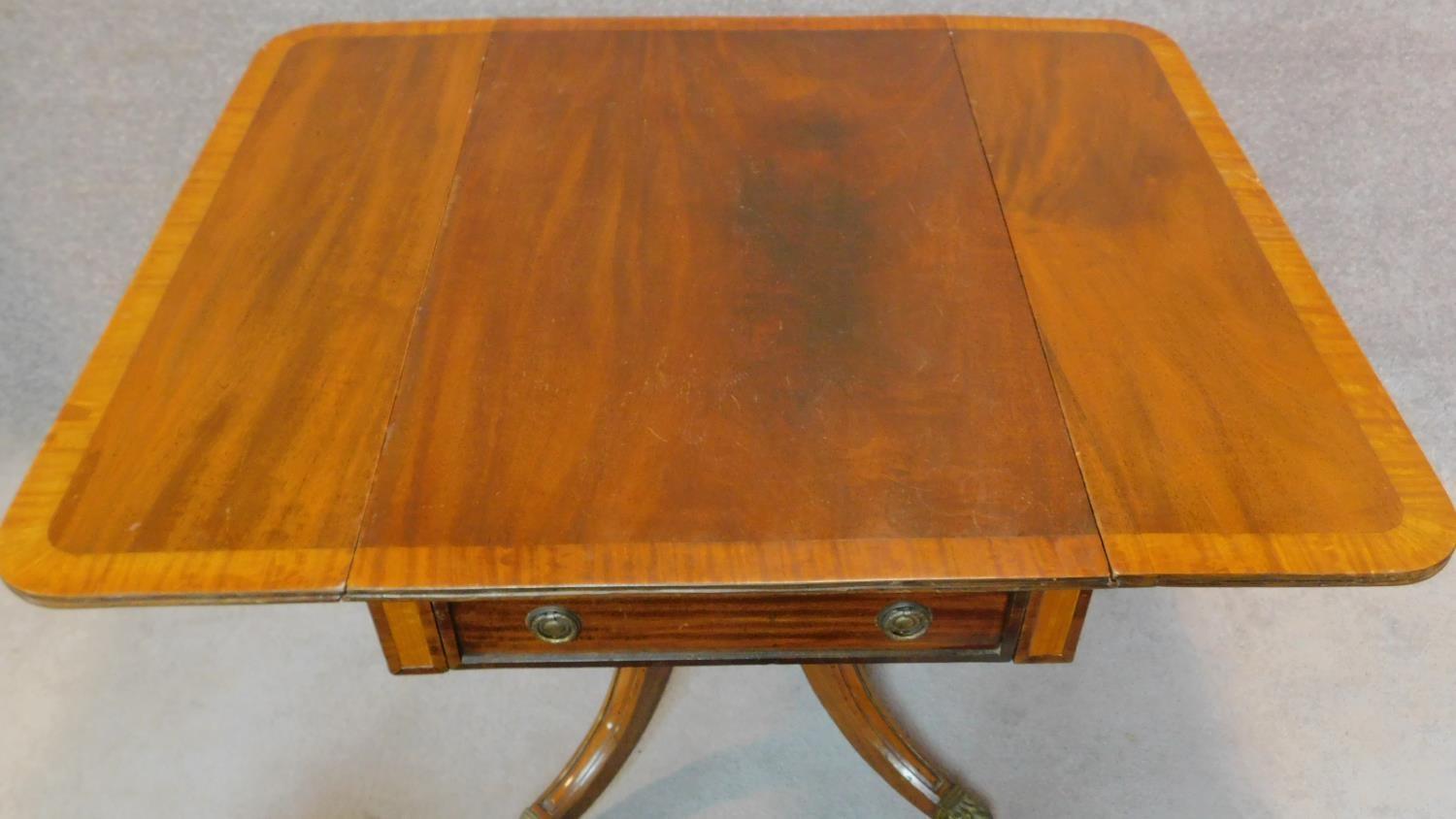 A Regency mahogany and satinwood crossbanded drop flap Pembroke table on carved quadruped cabriole - Image 8 of 8