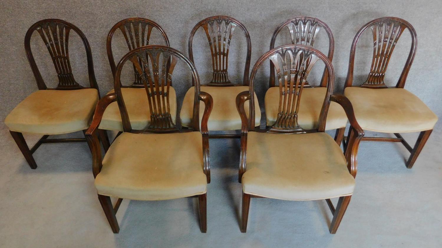A set of seven Hepplewhite style mahogany dining chairs (including two armchairs) H.95cm