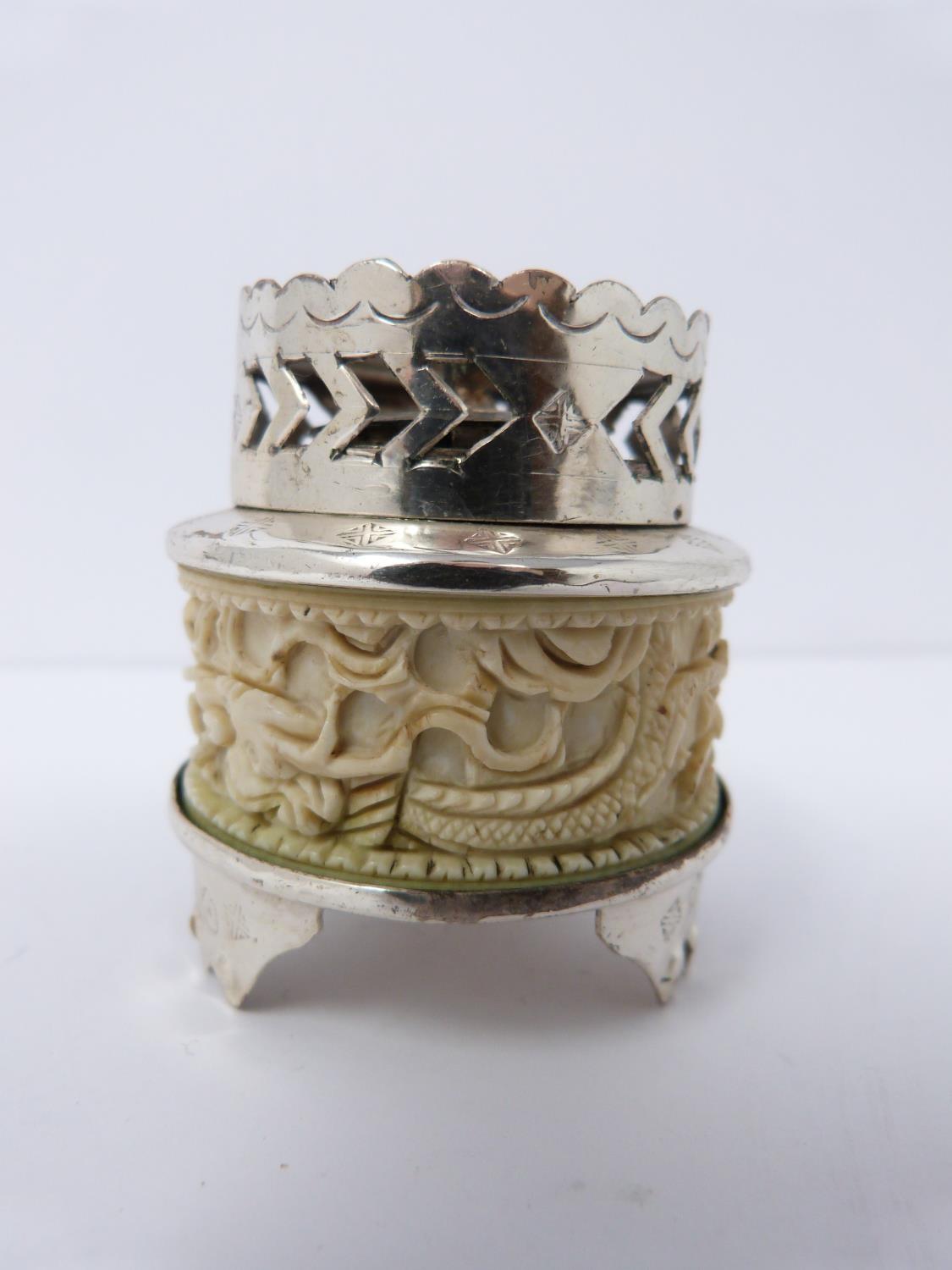 An early 20th century ivory puzzle ball and a small carved ivory and white metal burner, dragon - Image 2 of 7