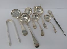 Georgian and Victorian silver sugar sifting ladles, tongs and boot hook, Georgian ladles and