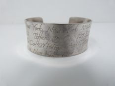 Tiffany & Co., silver engraved cuff, engraved with 'Tiffany & Co., New York, Fifth Avenue. Stamped