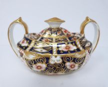 A Royal Crown Derby sugar bowl, hand painted and gilded imari pattern 1890. Marks to bottom.