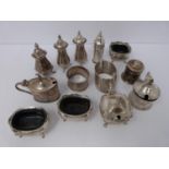 A collection of silver cruets and two silver napkin rings, Elkington and Co, Birmingham,