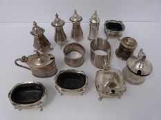 A collection of silver cruets and two silver napkin rings, Elkington and Co, Birmingham,