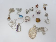 A collection of silver and silver and gem set jewellery, amethyst and pearl pendant, amethyst rings,