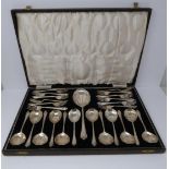 A cased set of Art Deco shell design silver forks and spoons, by P. Ashberry and Sons, 1929 and 1932