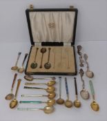 A collection of silver and enamel spoons, Norwegian and English, three spoons in a case,