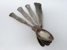 Five continental white metal spoon with engraved details. (199g).