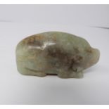 An early Ming Chinese carved jade pig, 7 cm x 4 cm. (116g).