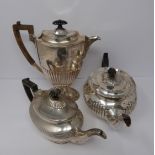 Two Victorian silver tea pots and a silver water jug, Sheffield, London and Sheffield, 1903,