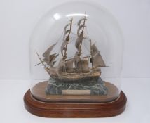 A silver model of the HMS Beagle 1831 in presentation case, 574/1000, mounted on alabaster base, A