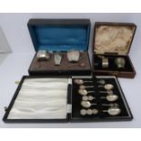 Hong silver spoons in box, cased silver christening set and cased silver cruet set, spoons having