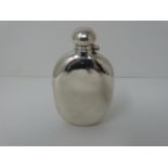 A Silver Harrods hip flask, Sheffield 1991, swilvel lock top. (171g).