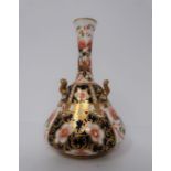 A Royal Crown Derby handled vase, Imari pattern, 1903. Marks to bottom.