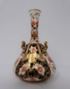 A Royal Crown Derby handled vase, Imari pattern, 1903. Marks to bottom.