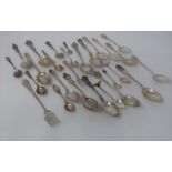A collection of silver spoons, including tourist and collector's spoons. (411g).