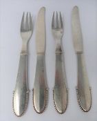 A Georg Jensen silver knife and fork set, full Danish hallmarked and makers mark for Georg