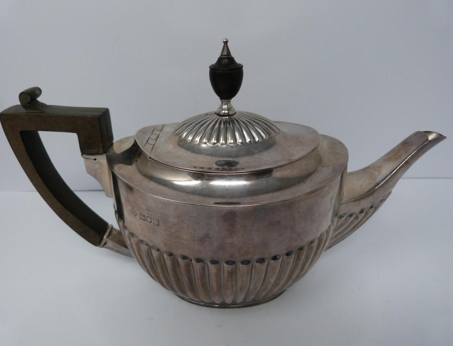 A three piece silver tea set, sugar, tea pot and milk jug, tea pot and helmet jug Ebony handle by - Image 2 of 10