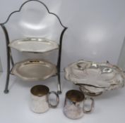 A silver plated cake stand, handled basket and two tankards, basket stamped EPNS, 13694, flower form