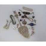 A mixed lot of silver and gold jewellery and a white metal spoon. (234g).