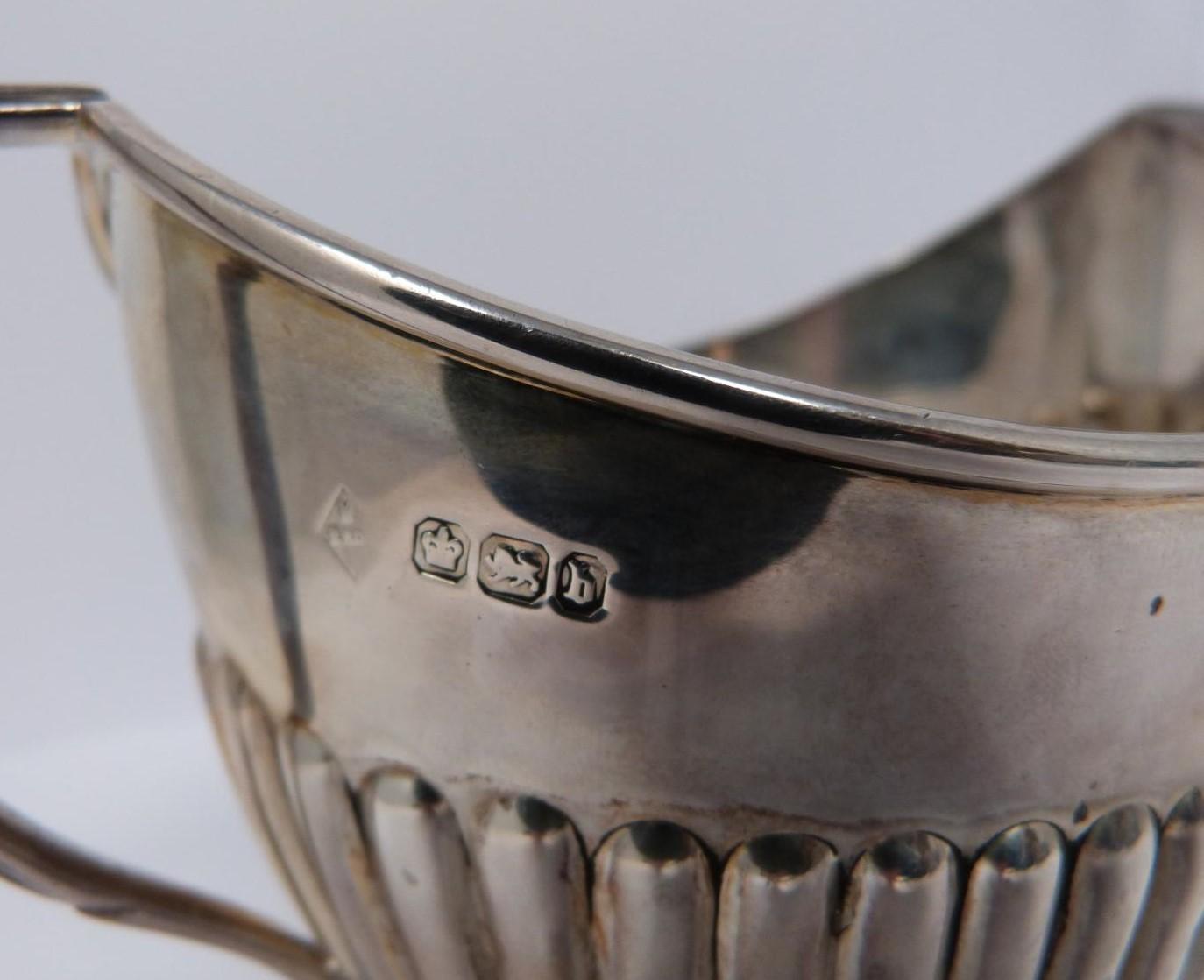 A three piece silver tea set, sugar, tea pot and milk jug, tea pot and helmet jug Ebony handle by - Image 8 of 10