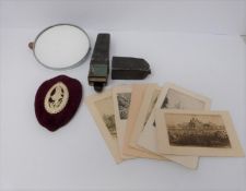 A set of signed etched postcards, bone carved plaque, shaving mirror and vintage razor in case