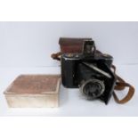 Zeiss Ikon vintage camera in leather case and french engraved cigarette box, box with scene of