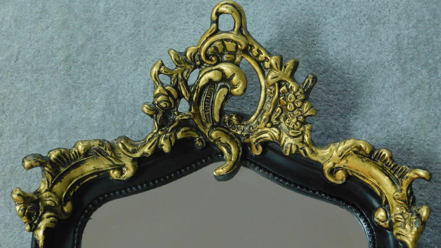 A rococo style gilt and ebonised pier mirror. 115x52cm - Image 3 of 4